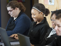 Students working on laptops.