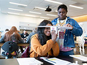 Experience Central students participating in a medical program activity.