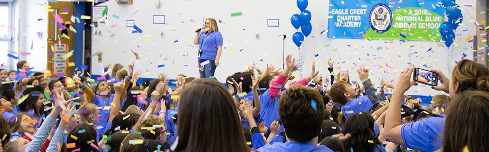 Students and staff at Eagle Crest Charter Academy celebrating at their National Blue Ribbon School Award assembly.